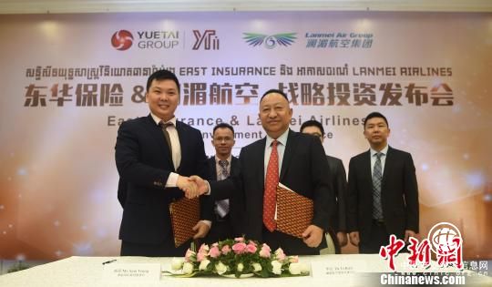 图为签约现场。　黄耀辉 摄