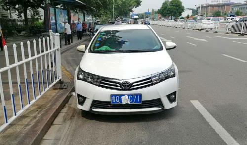 故意遮挡号牌，驾驶证被扣12分！