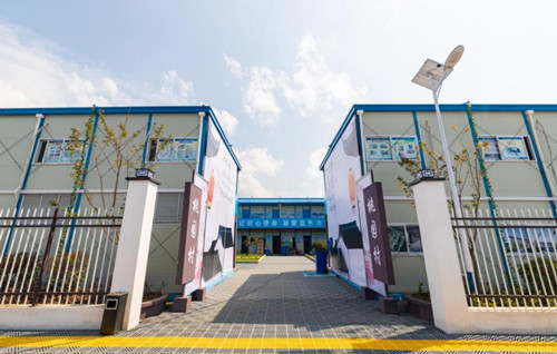 走进雪浪山下工友村