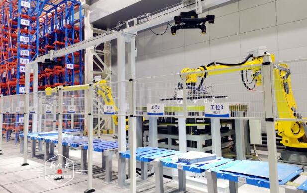 哈电电机机器人自动叠片生产线上线