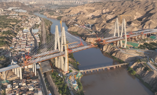 黄河上游首座八车道跨河大桥即将跨越天险实现“牵手”